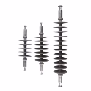 Three composite suspension insulators with ball-and-socket fittings, showing different sizes and shed configurations for various voltage levels
