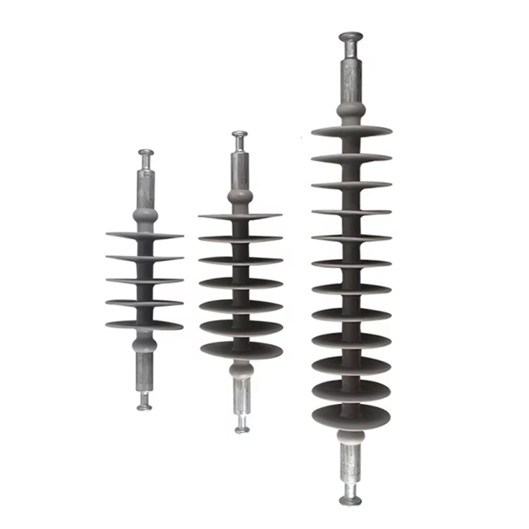 Three composite suspension insulators with ball-and-socket fittings, showing different sizes and shed configurations for various voltage levels