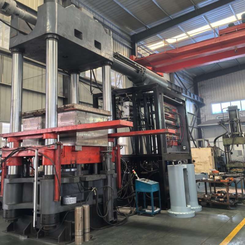 Large four-column rubber injection molding machine in factory workshop, vulcanization equipment for power insulators and fittings, high-precision hydraulic clamping for efficient rubber product molding